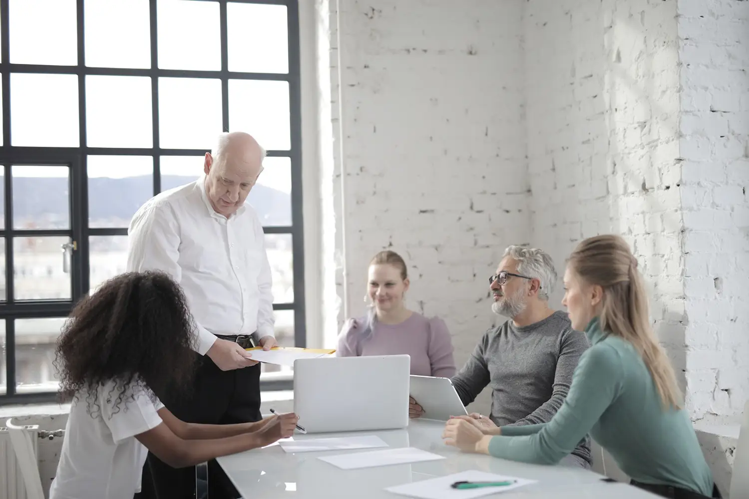 Senior partner working with the next generation of accounting firm leaders